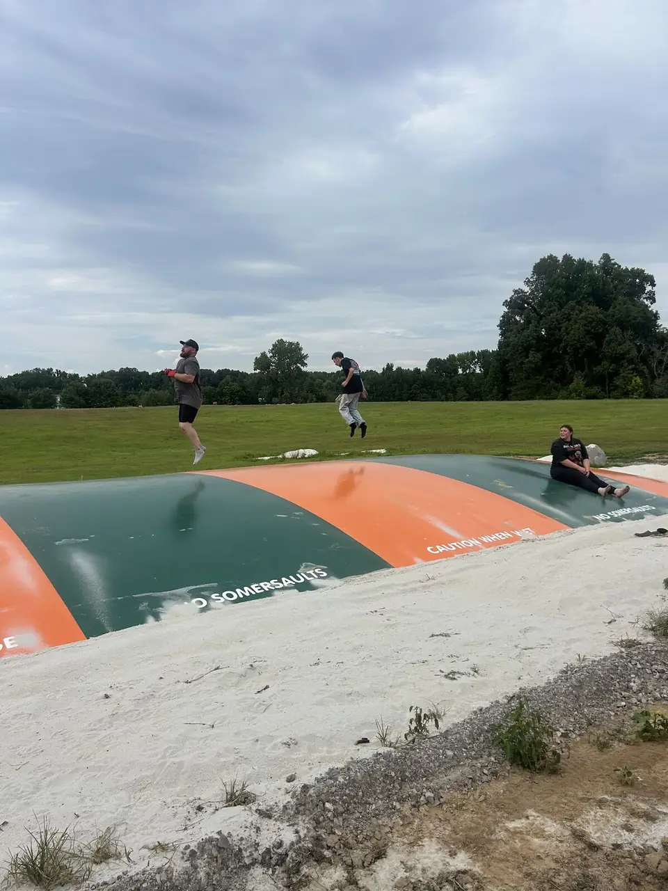 Kids jumping on the inflatable jump pillow