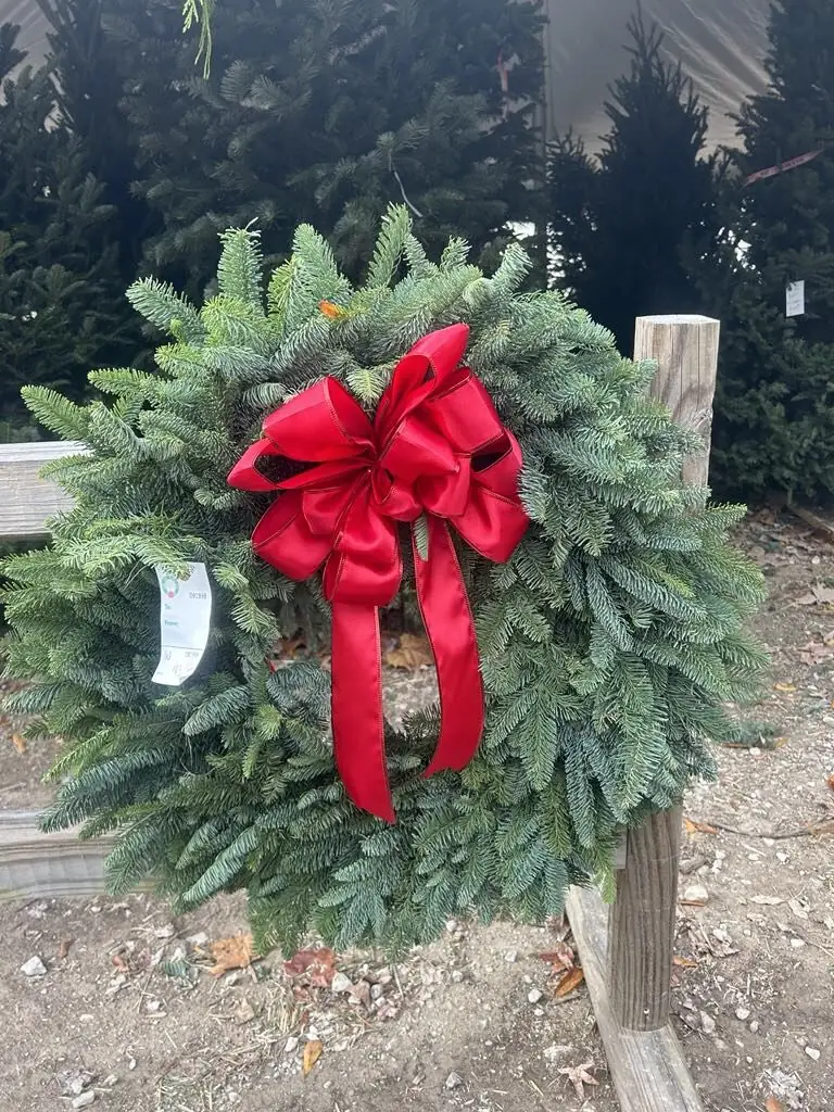 A fresh wreath with a red bow